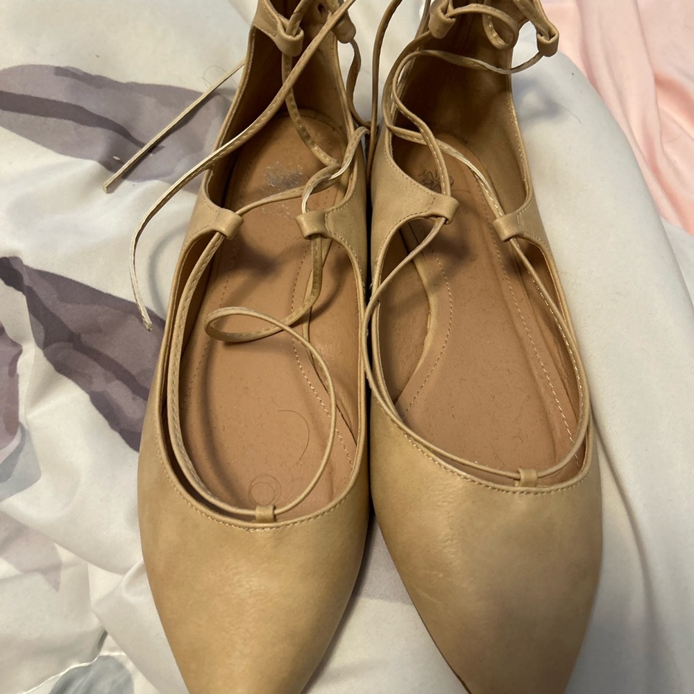 Tan sandals.